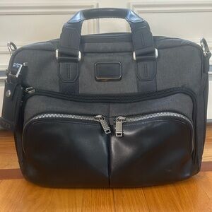Tumi soft canvas / leather briefcase.